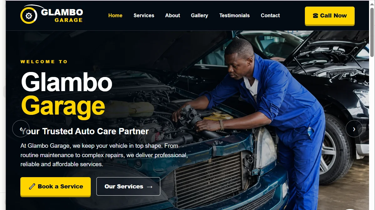 Glambo Garage homepage with a mechanic working on an engine